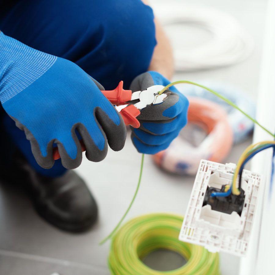Professional electrician working on the electrical system